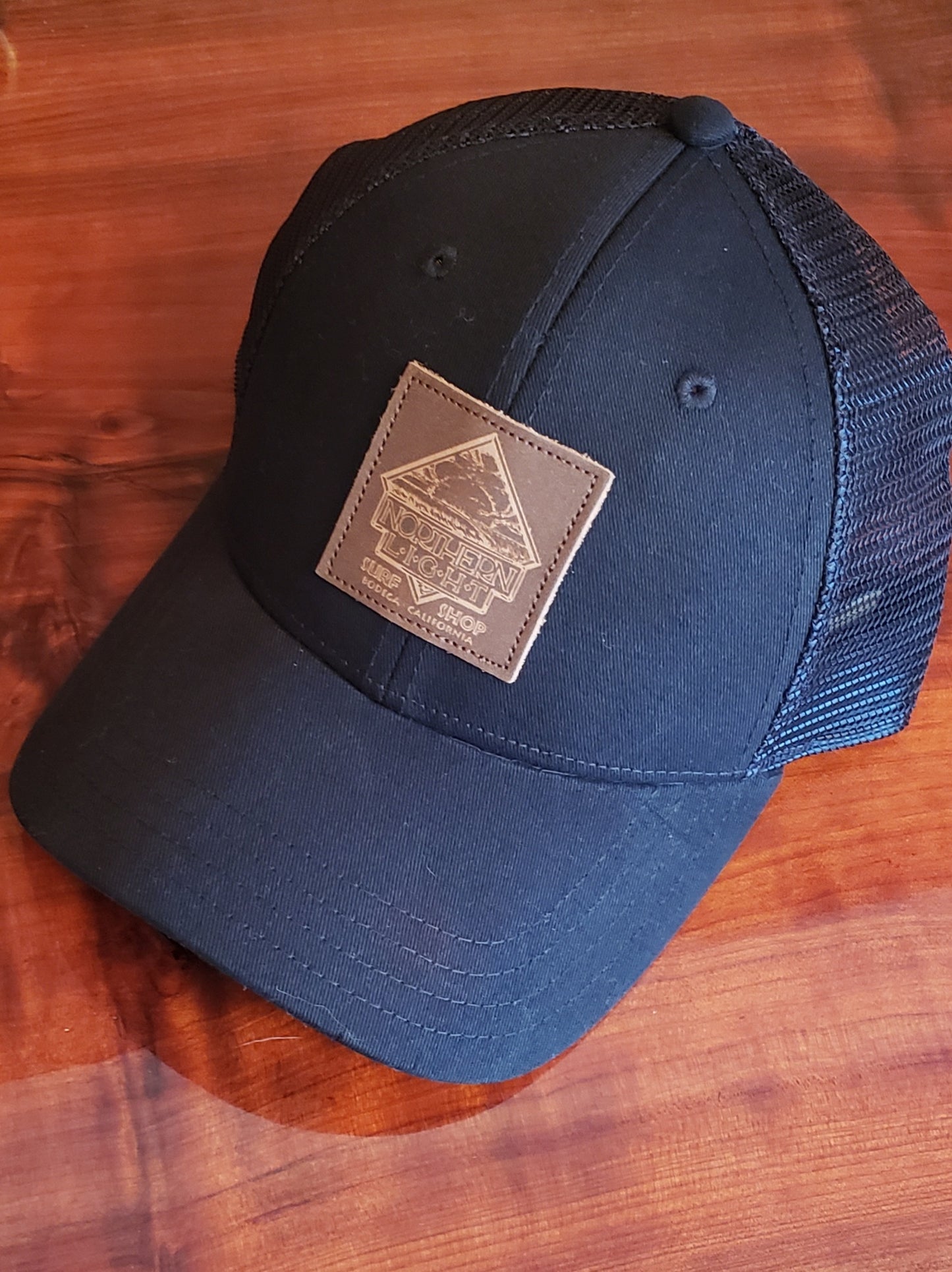 LEATHER PATCH TRUCKER SNAP BACK HAT