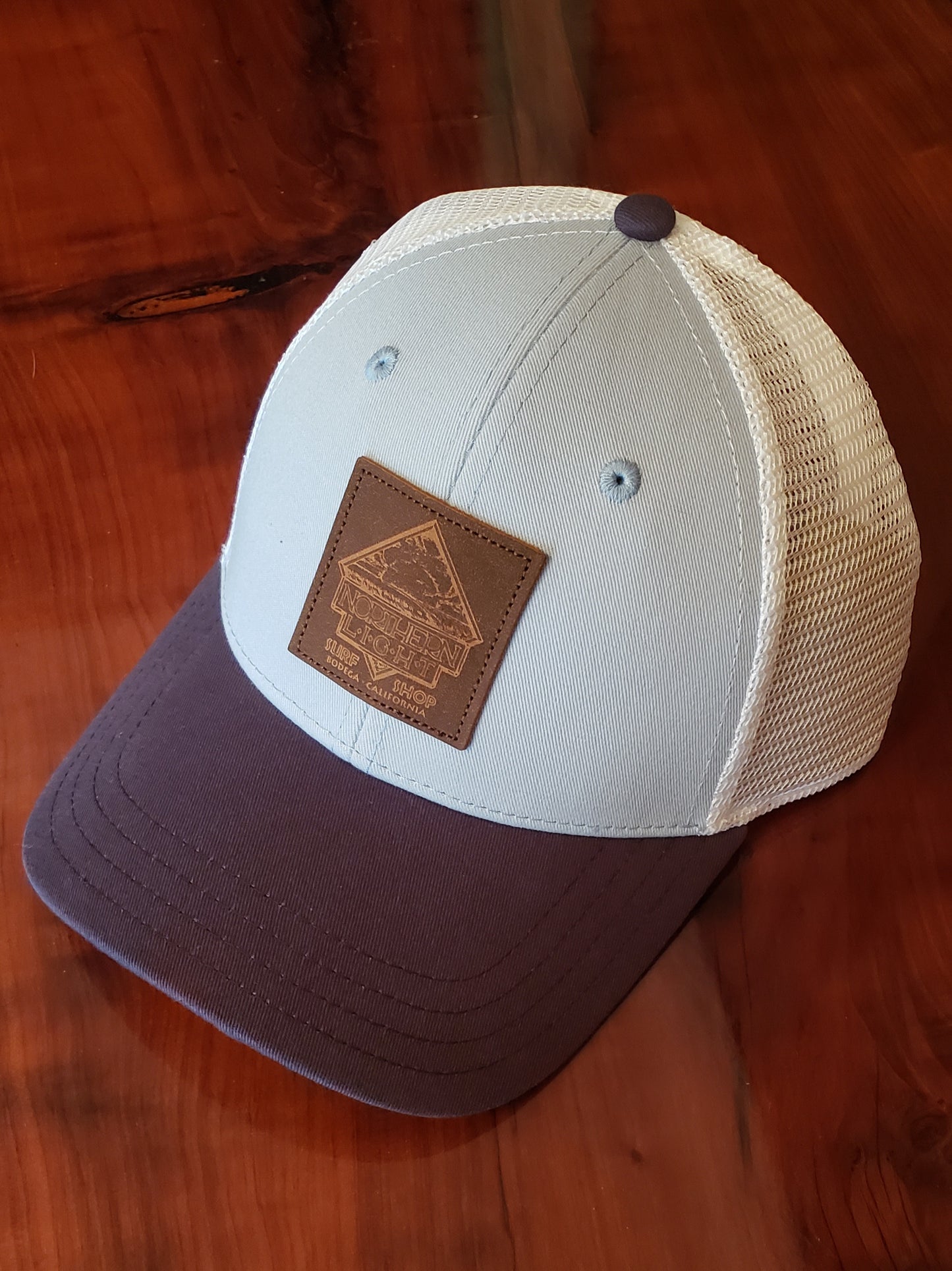 LEATHER PATCH TRUCKER SNAP BACK HAT