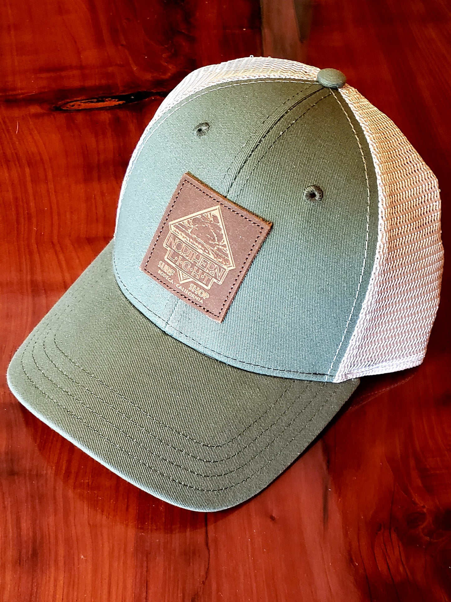 LEATHER PATCH TRUCKER SNAP BACK HAT